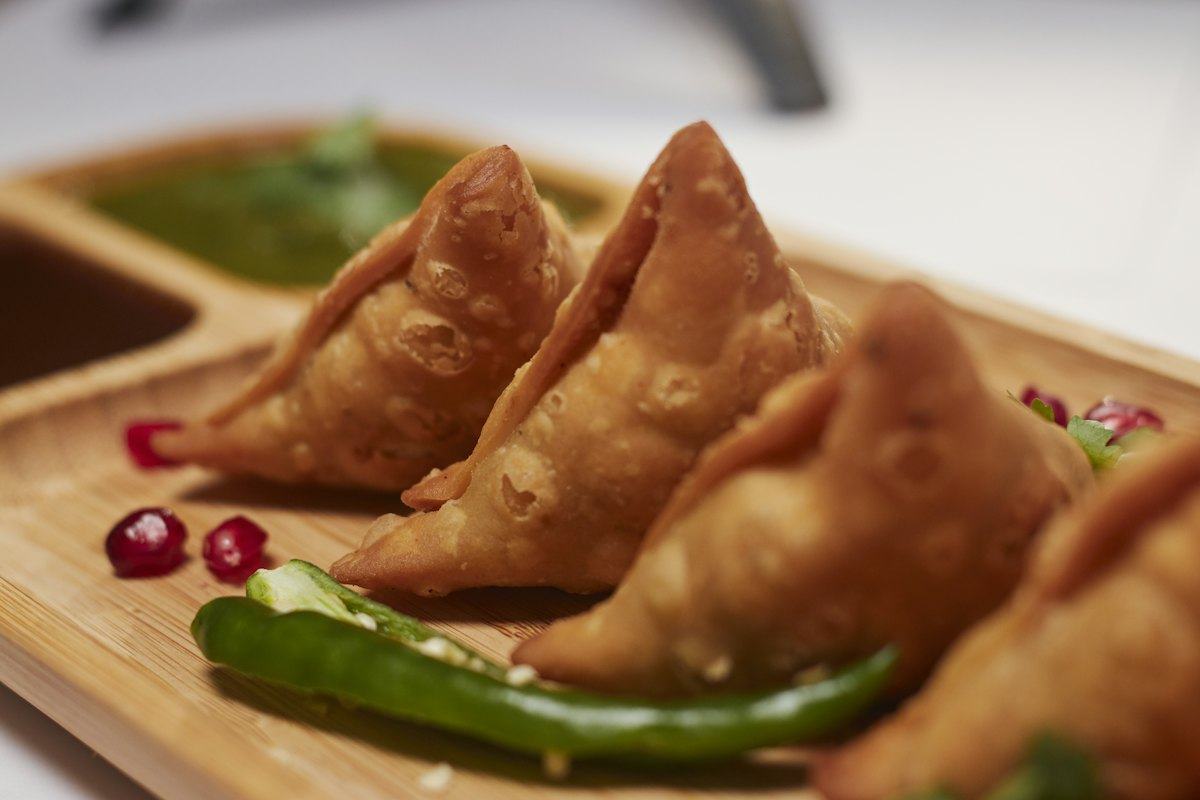Samosas with a green chilli